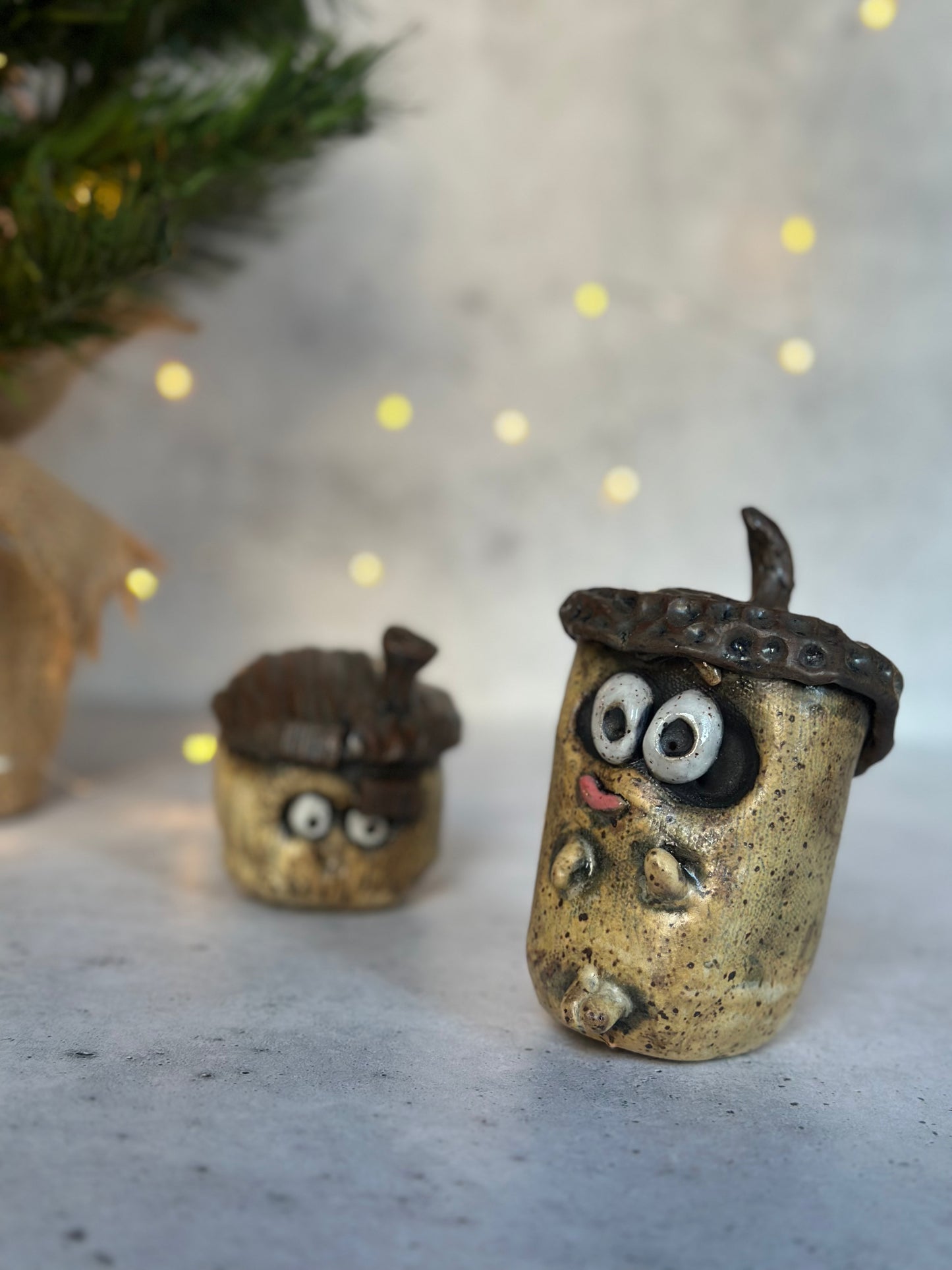 two acorns on a decorative background