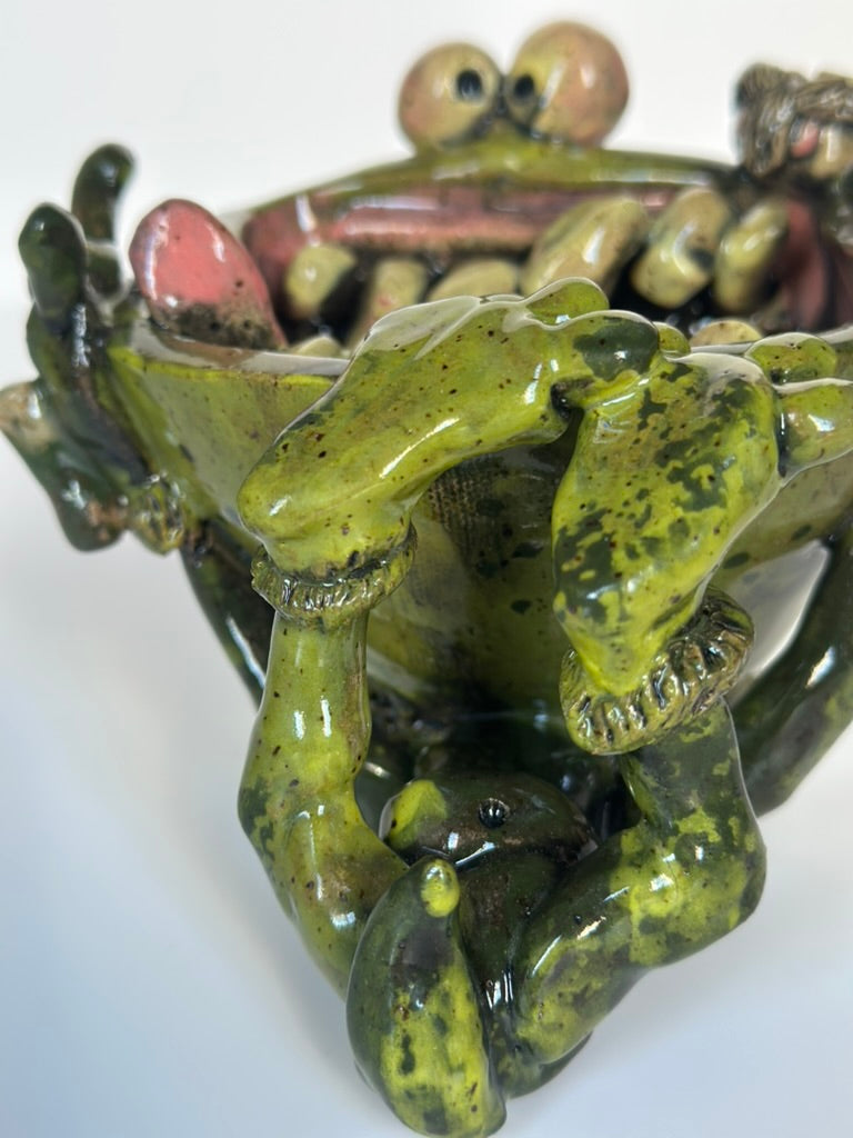 Ceramic lizard on a white background