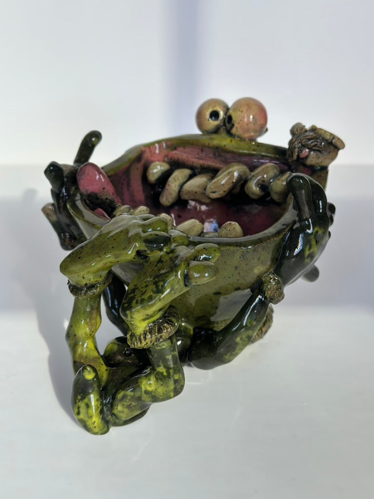 Ceramic Lizard with open mouth on a white background