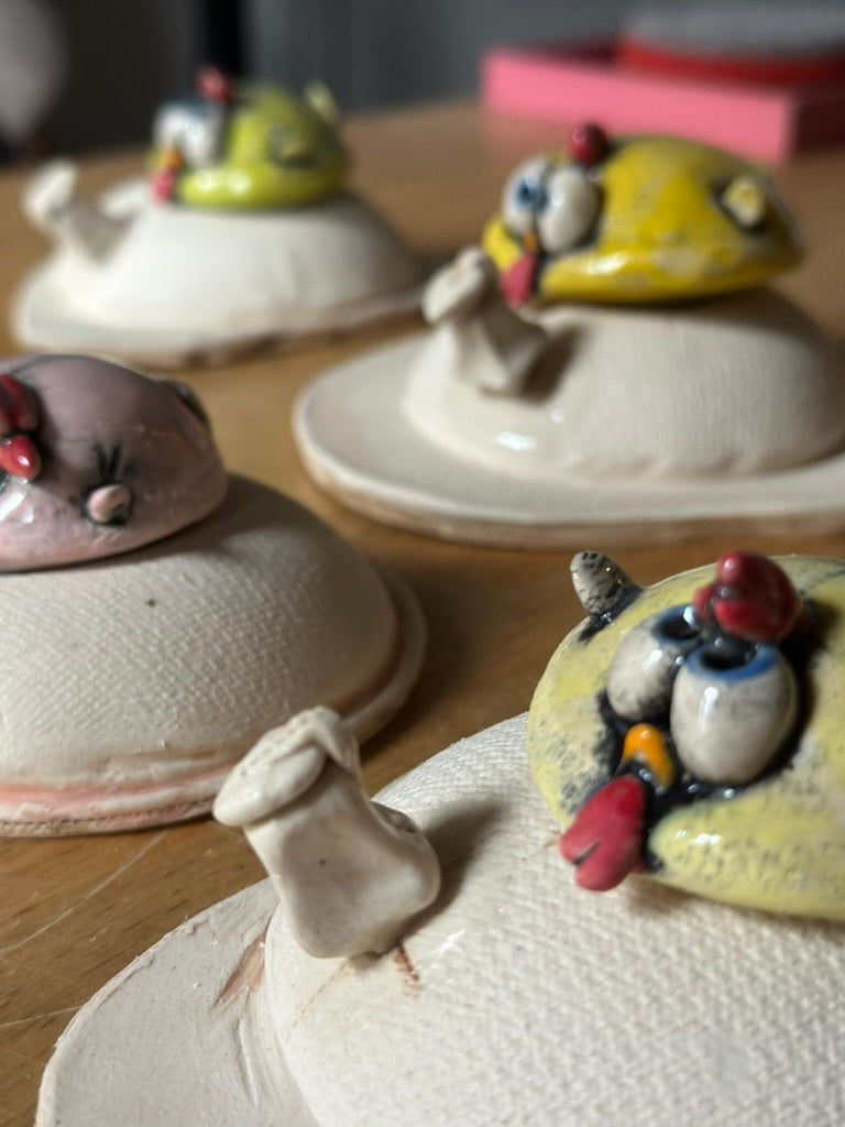 Group of ceramic chickens