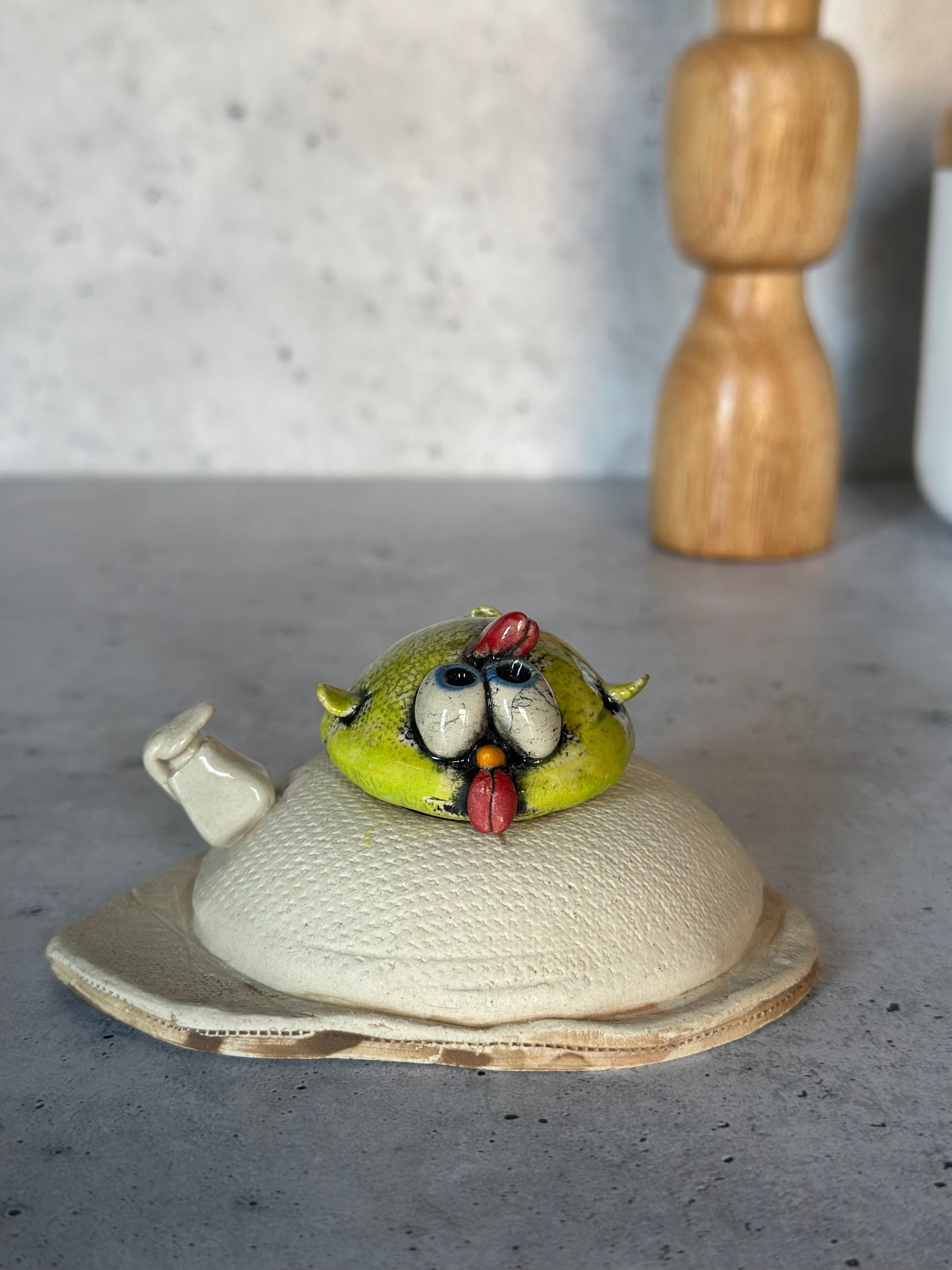 Decorative chick on a gray surface