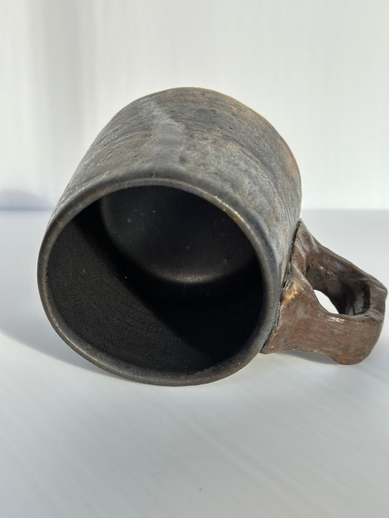 Top of Ceramic mug with a handle on a white backgroundc